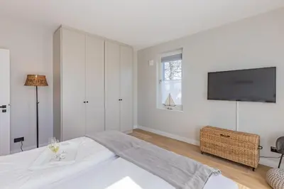 Ein Bett oder Betten in einem Zimmer der Unterkunft BLACK PEARL Penthouse Black Pearl
