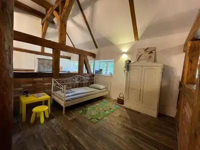 Ein Bett oder Betten in einem Zimmer der Unterkunft Idyllische Ferienwohnung auf dem Land