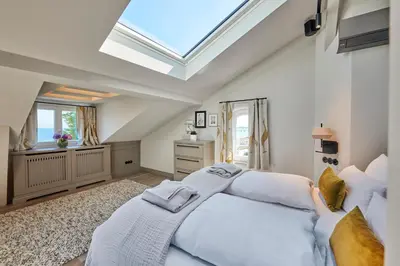 Ein Bett oder Betten in einem Zimmer der Unterkunft Goldmädchen 93 - Honeymoon Suite