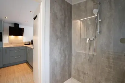 Ein Badezimmer in der Unterkunft Ostseecamp Lübecker Bucht Ferienhaus 