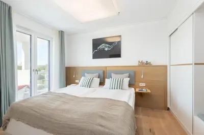 Ein Bett oder Betten in einem Zimmer der Unterkunft View 91 Sonnenschein Scharbeutz