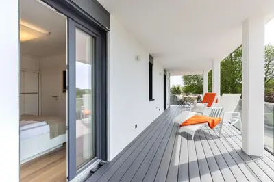 Ein Bett oder Betten in einem Zimmer der Unterkunft View 91 Sonnenschein Scharbeutz