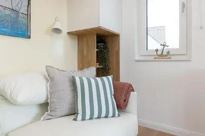 Ein Bett oder Betten in einem Zimmer der Unterkunft View 91 Sonnenschein Scharbeutz