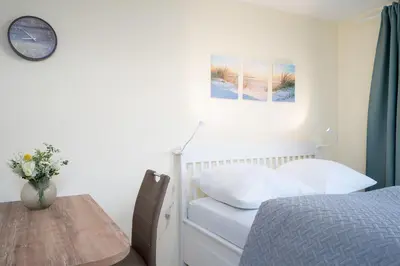 Ein Bett oder Betten in einem Zimmer der Unterkunft Haus Seeburg Ostseebrise Arosa