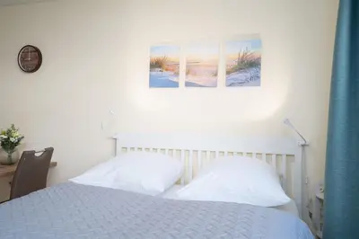Ein Bett oder Betten in einem Zimmer der Unterkunft Haus Seeburg Ostseebrise Arosa