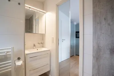 Ein Badezimmer in der Unterkunft Ostseecamp Lübecker Bucht Ferienhaus 