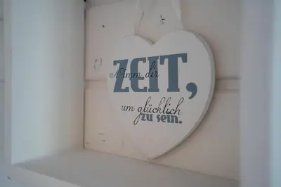 Ein Zertifikat, Auszeichnung, Logo oder anderes Dokument, das in der Unterkunft Ostseecamp Lübecker Bucht Ferienhaus 