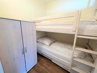 Ein Bett oder Betten in einem Zimmer der Unterkunft Ferienpark Sierksdorf App 28 - Strandlage