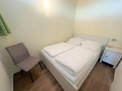 Ein Bett oder Betten in einem Zimmer der Unterkunft Ferienpark Sierksdorf App 28 - Strandlage