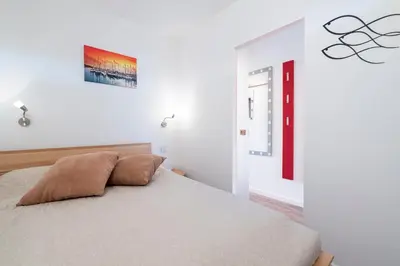 Ein Bett oder Betten in einem Zimmer der Unterkunft Ferienpark Sierksdorf App 27 - Strandlage