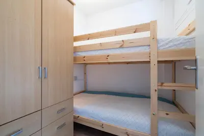 Ein Bett oder Betten in einem Zimmer der Unterkunft Ferienpark Sierksdorf App 27 - Strandlage
