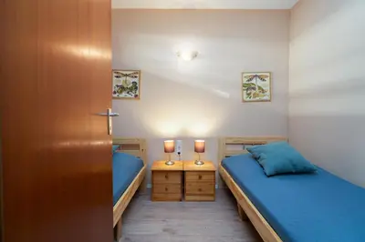 Ein Bett oder Betten in einem Zimmer der Unterkunft Ferienpark Sierksdorf App 61 - Strandlage