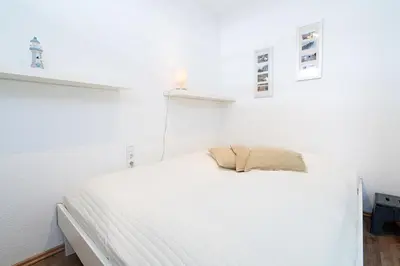 Ein Bett oder Betten in einem Zimmer der Unterkunft Ferienpark Sierksdorf App 108 - Strandlage