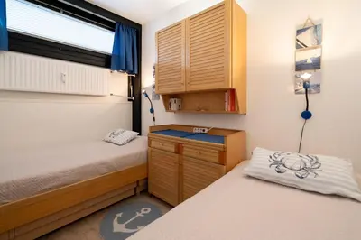 Ein Bett oder Betten in einem Zimmer der Unterkunft Ferienpark Sierksdorf App 202 - Strandlage