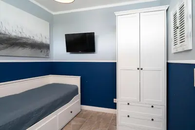 Ein Bett oder Betten in einem Zimmer der Unterkunft Ferienpark Sierksdorf App 120 - Strandlage