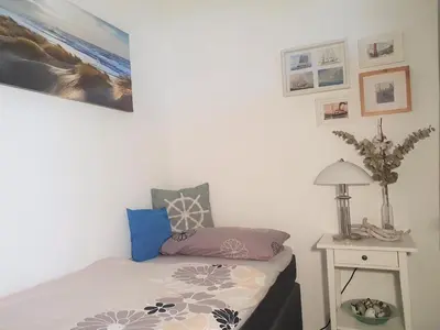 Ein Bett oder Betten in einem Zimmer der Unterkunft Ferienpark Sierksdorf App 172 - Strandlage