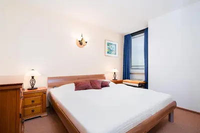 Ein Bett oder Betten in einem Zimmer der Unterkunft Ferienpark Sierksdorf App 304 - Strandlage
