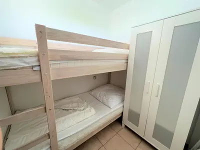 Ein Bett oder Betten in einem Zimmer der Unterkunft Ferienpark Sierksdorf App 205 - Strandlage