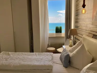 Ein Bett oder Betten in einem Zimmer der Unterkunft Ferienpark Sierksdorf App 302 - Strandlage
