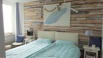 Ein Bett oder Betten in einem Zimmer der Unterkunft Ferienpark Sierksdorf App 302 - Strandlage