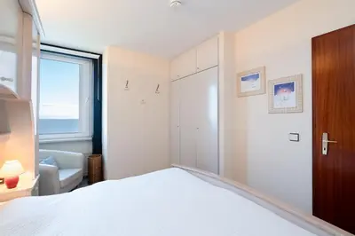 Ein Bett oder Betten in einem Zimmer der Unterkunft Ferienpark Sierksdorf App 295 - Strandlage