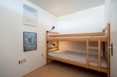 Ein Bett oder Betten in einem Zimmer der Unterkunft Ferienpark Sierksdorf App 323 - Strandlage