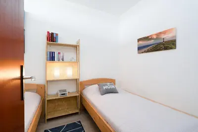 Ein Bett oder Betten in einem Zimmer der Unterkunft Ferienpark Sierksdorf App 444 - Strandlage