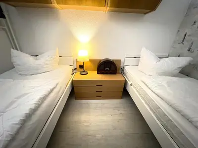 Ein Bett oder Betten in einem Zimmer der Unterkunft Ferienpark Sierksdorf App 453 - Strandlage
