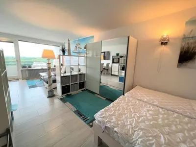 Ein Bett oder Betten in einem Zimmer der Unterkunft Ferienpark Sierksdorf App 337 - Strandlage