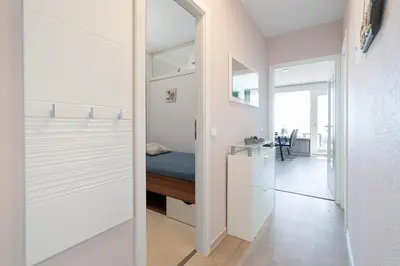 Ein Bett oder Betten in einem Zimmer der Unterkunft Ferienpark Sierksdorf App 420 - Strandlage