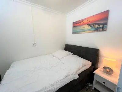 Ein Bett oder Betten in einem Zimmer der Unterkunft Ferienpark Sierksdorf App 413 - Strandlage