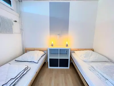 Ein Bett oder Betten in einem Zimmer der Unterkunft Ferienpark Sierksdorf App 485 - Strandlage