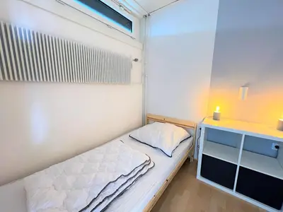 Ein Bett oder Betten in einem Zimmer der Unterkunft Ferienpark Sierksdorf App 485 - Strandlage
