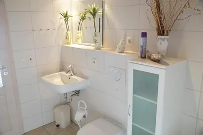 Ein Badezimmer in der Unterkunft Strandpark Sierksdorf H073