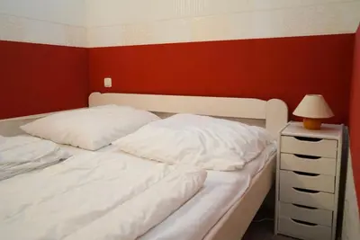 Ein Bett oder Betten in einem Zimmer der Unterkunft Ferienpark Sierksdorf App 763 - Strandlage