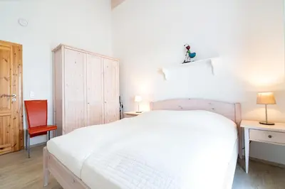 Ein Bett oder Betten in einem Zimmer der Unterkunft Strandpark Sierksdorf H060