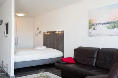 Ein Bett oder Betten in einem Zimmer der Unterkunft Ferienpark Sierksdorf App 750 - Strandlage