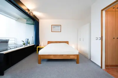 Ein Bett oder Betten in einem Zimmer der Unterkunft Ferienpark Sierksdorf App 715 - Strandlage