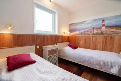 Ein Bett oder Betten in einem Zimmer der Unterkunft Ferienpark Sierksdorf App 748 - Strandlage