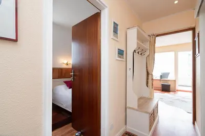 Ein Bett oder Betten in einem Zimmer der Unterkunft Ferienpark Sierksdorf App 748 - Strandlage