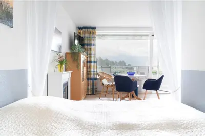 Ein Bett oder Betten in einem Zimmer der Unterkunft Ferienpark Sierksdorf App 564 - Strandlage