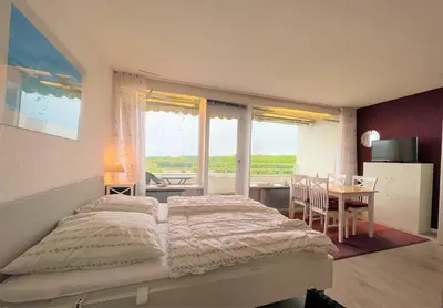 Ein Bett oder Betten in einem Zimmer der Unterkunft Ferienpark Sierksdorf App 775 - Strandlage