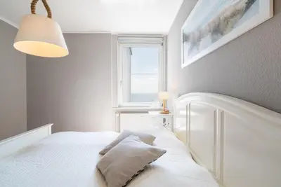 Ein Bett oder Betten in einem Zimmer der Unterkunft Ferienpark Sierksdorf App 864 - Strandlage