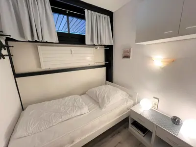 Ein Bett oder Betten in einem Zimmer der Unterkunft Ferienpark Sierksdorf App 06 - Strandlage