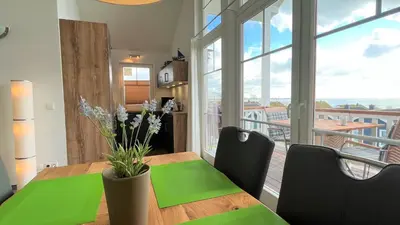 Ein Sitzbereich in der Unterkunft Strandpark Sierksdorf H066