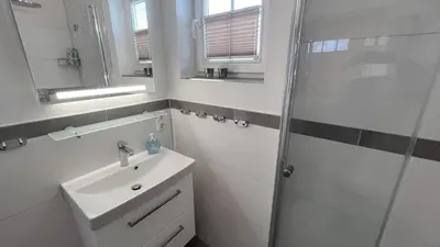 Ein Badezimmer in der Unterkunft Strandpark Sierksdorf H066