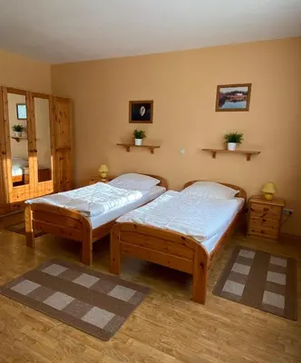 Ein Bett oder Betten in einem Zimmer der Unterkunft Jägerhof Ostsee GmbH