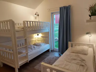 Ein Bett oder Betten in einem Zimmer der Unterkunft Strandpark Sierksdorf H081