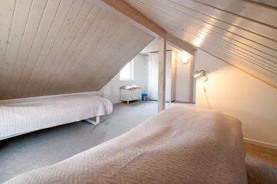 Ein Bett oder Betten in einem Zimmer der Unterkunft Strandpark Sierksdorf H056