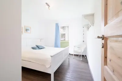 Ein Bett oder Betten in einem Zimmer der Unterkunft Strandpark Sierksdorf H064